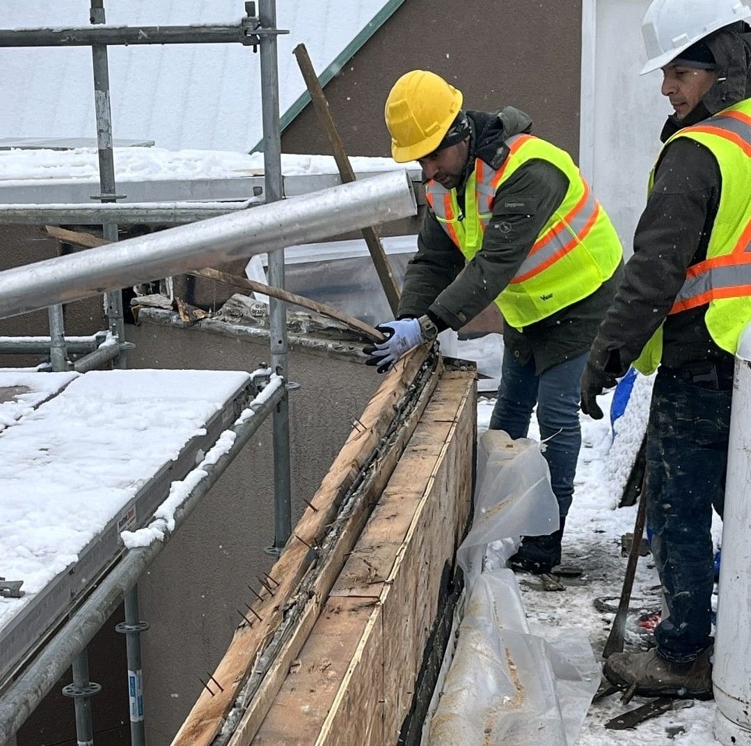 Pacific Custom Builders crew working on an active job site